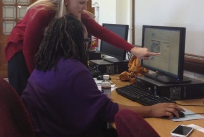 Technology teacher with a student.