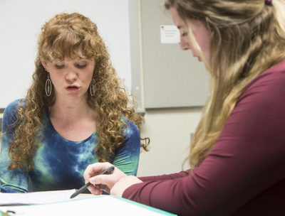 Female therapist working with patient.